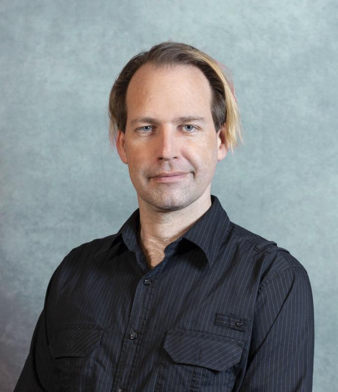 Picture of Joe Biel: Person in a dark collared shirt